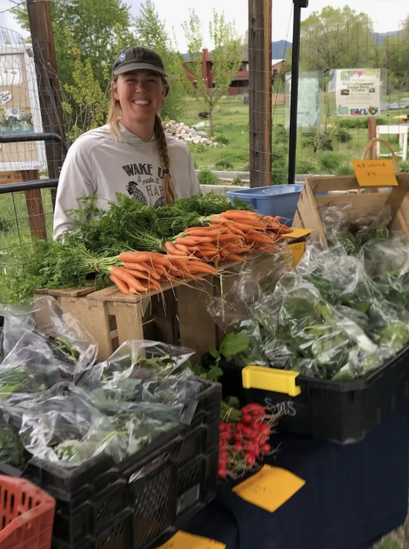 Woman at Farmstand